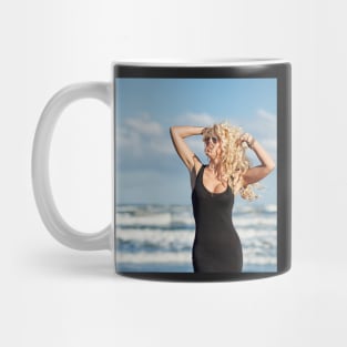 Sexy woman on the sea shore Mug